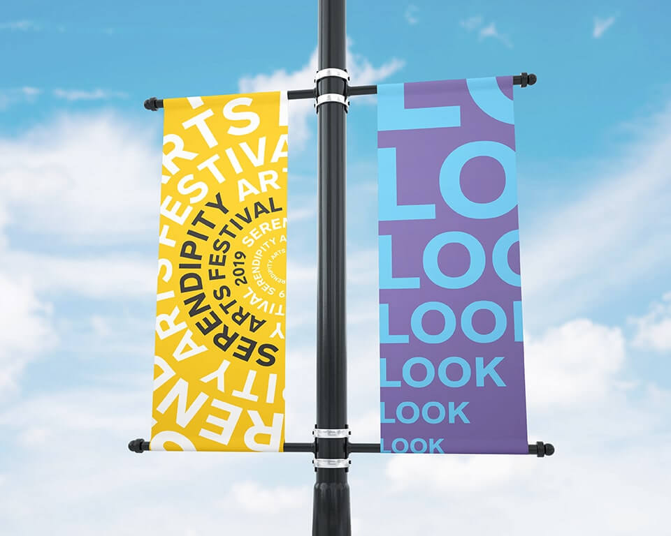 Photo of double-sided flag poles showing SAF 2019 branding